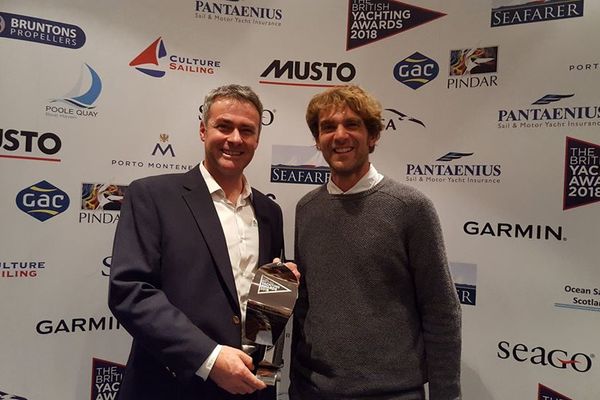 Alastair Clarke accepts the award on behalf of Portland and Weymouth marinas from Sailing Today editor Sam Jefferson   